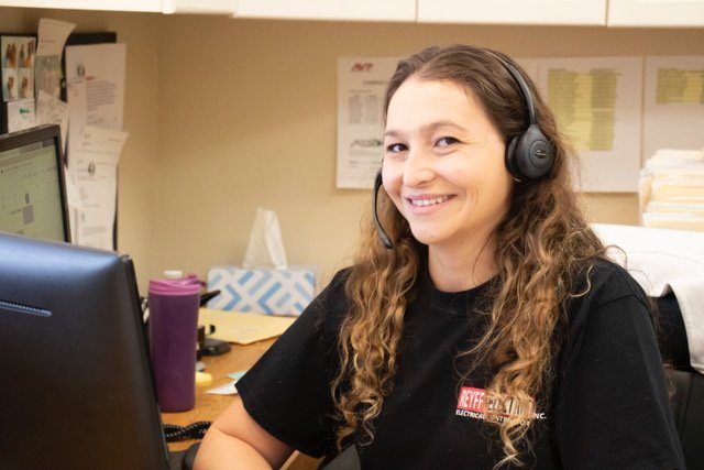 Reyff Electric office team member ready to schedule your appointment